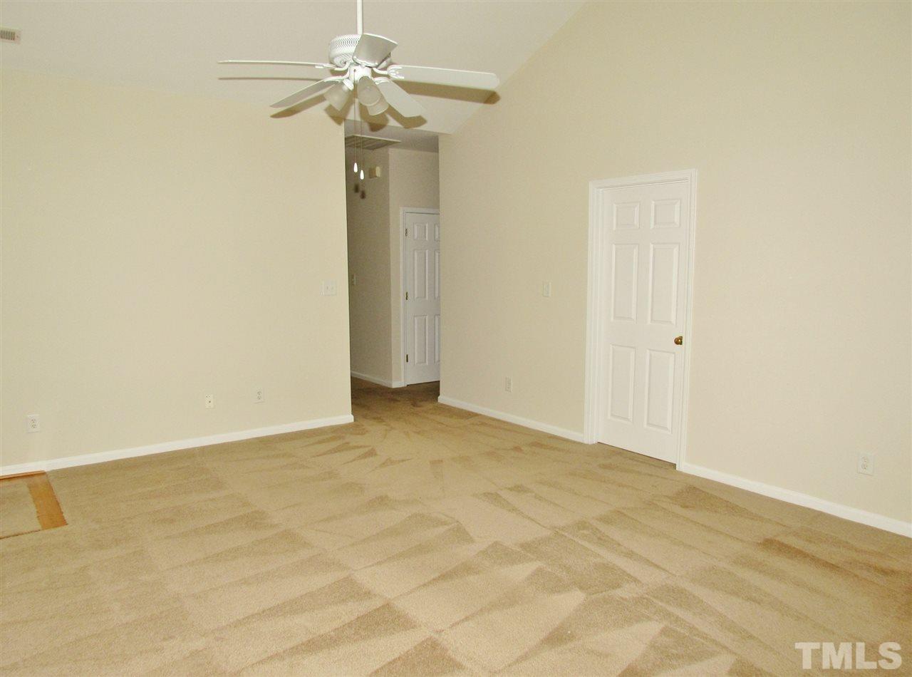 2700 Andover Glen Road Raleigh, NC 27604 - Photo 9 of 25 a view of a small space with a chandelier fan