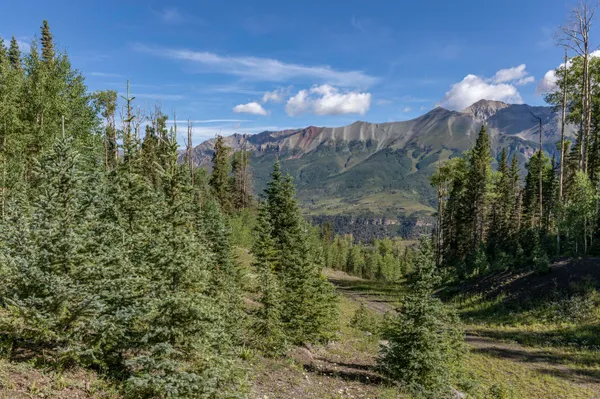 a view of a house in a field