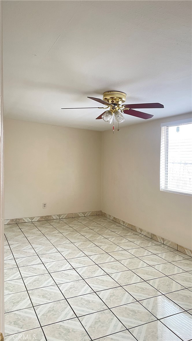 14425 Manzano Road Victorville, CA 92392 - Photo 13 of 21 a view of a room with rack on the wall
