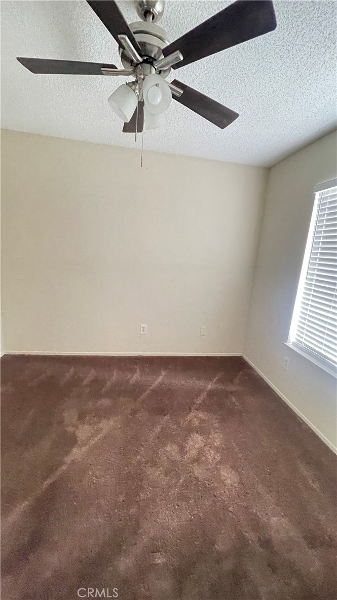 14425 Manzano Road Victorville, CA 92392 - Photo 17 of 21 a view of a room with an empty space