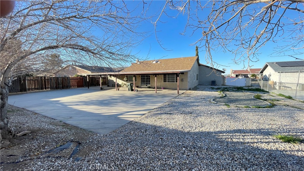14425 Manzano Road Victorville, CA 92392 - Photo 21 of 21 a view of a house with a backyard