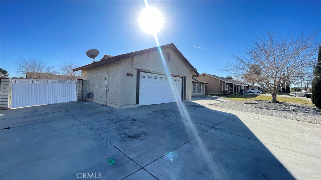 14425 Manzano Road Victorville, CA 92392 - Photo 4 of 21 a view of a house with a yard