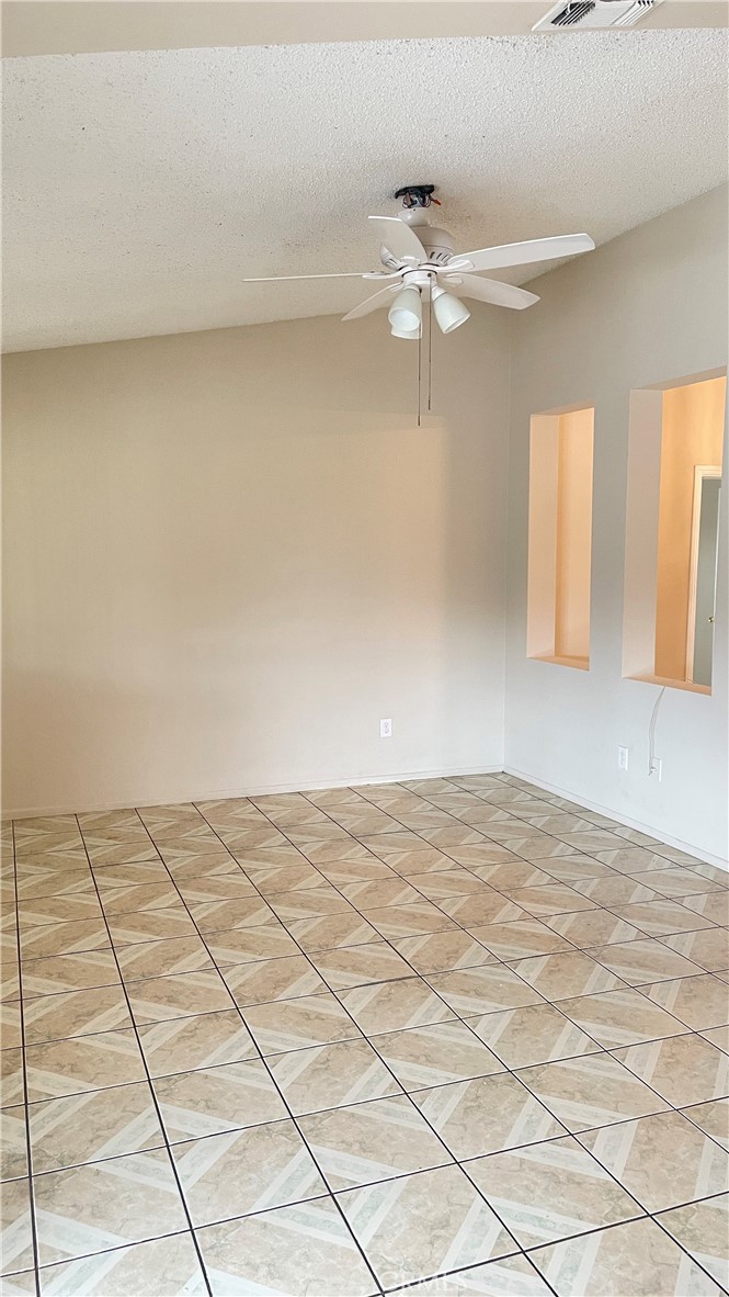 14425 Manzano Road Victorville, CA 92392 - Photo 10 of 21 a view of an empty room and window