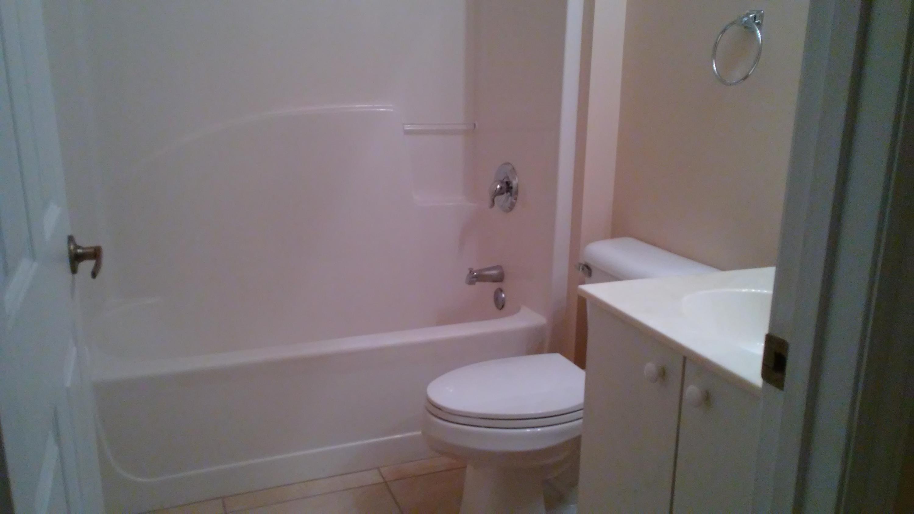 832 Southwest Duncan Terrace Port St. Lucie, FL 34953 - Photo 21 of 37 a bathroom with a sink a toilet and shower