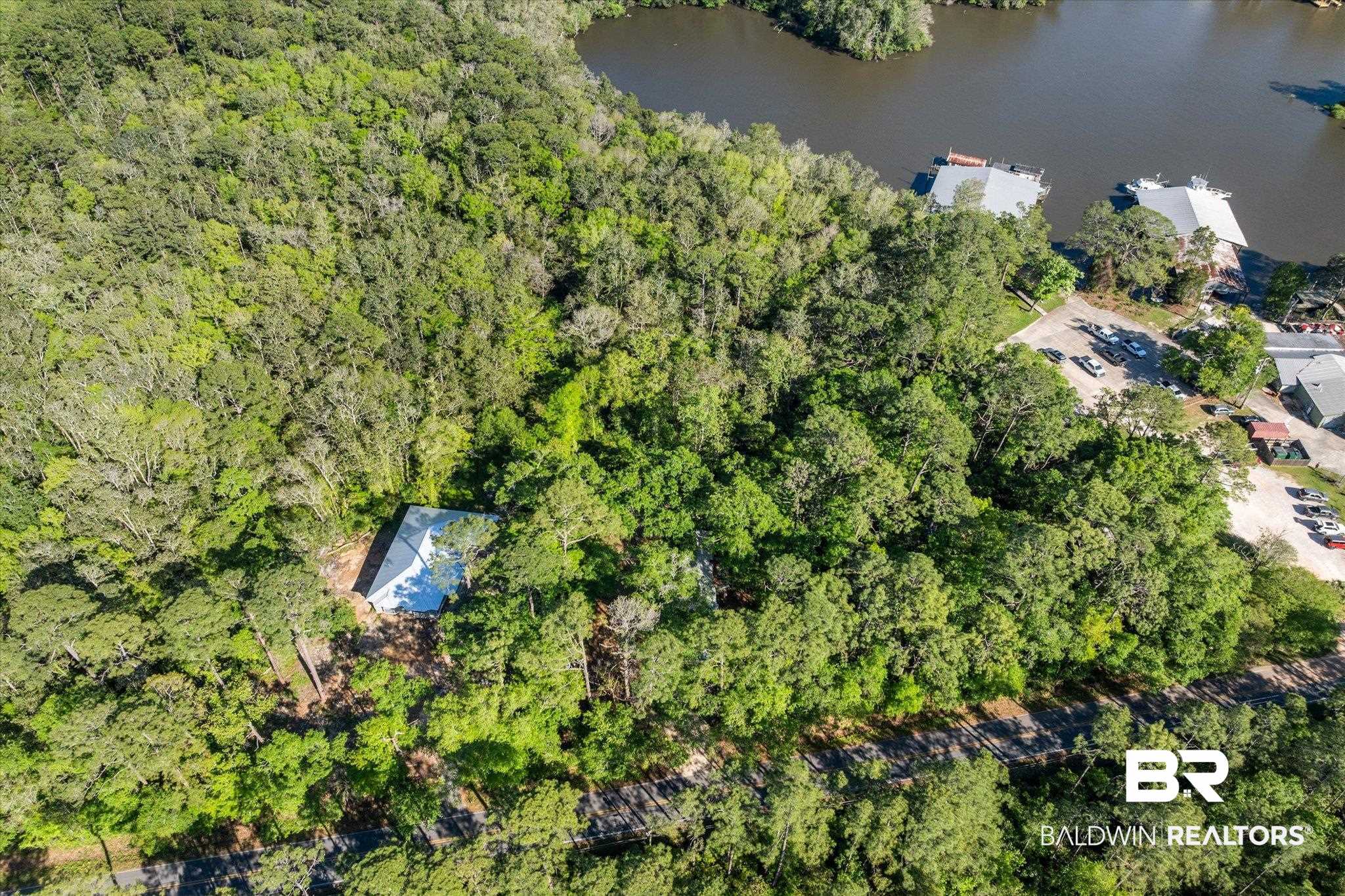 16620 Ferry Road Fairhope, AL 36532 - Photo 5 of 28 Drone / aerial view with a wooded view and a water view