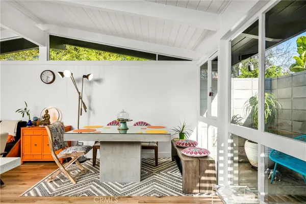 a outdoor living space with furniture and garden view