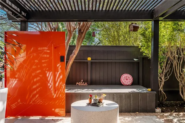a outdoor space with patio the couches and a potted plant with outer view