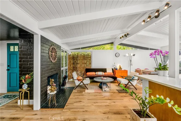 a living room with patio furniture