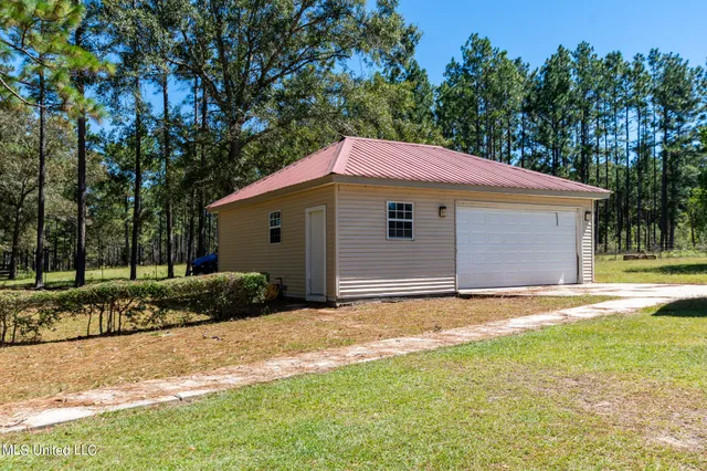 $675,000 | 114 East T Poole Road, Poplarville, MS 39470