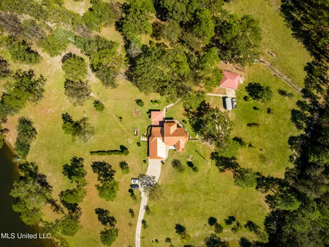 $675,000 | 114 East T Poole Road, Poplarville, MS 39470