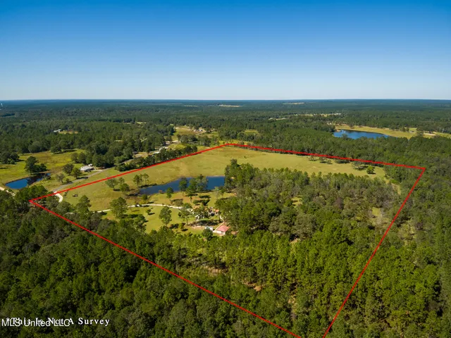 $675,000 | 114 East T Poole Road, Poplarville, MS 39470