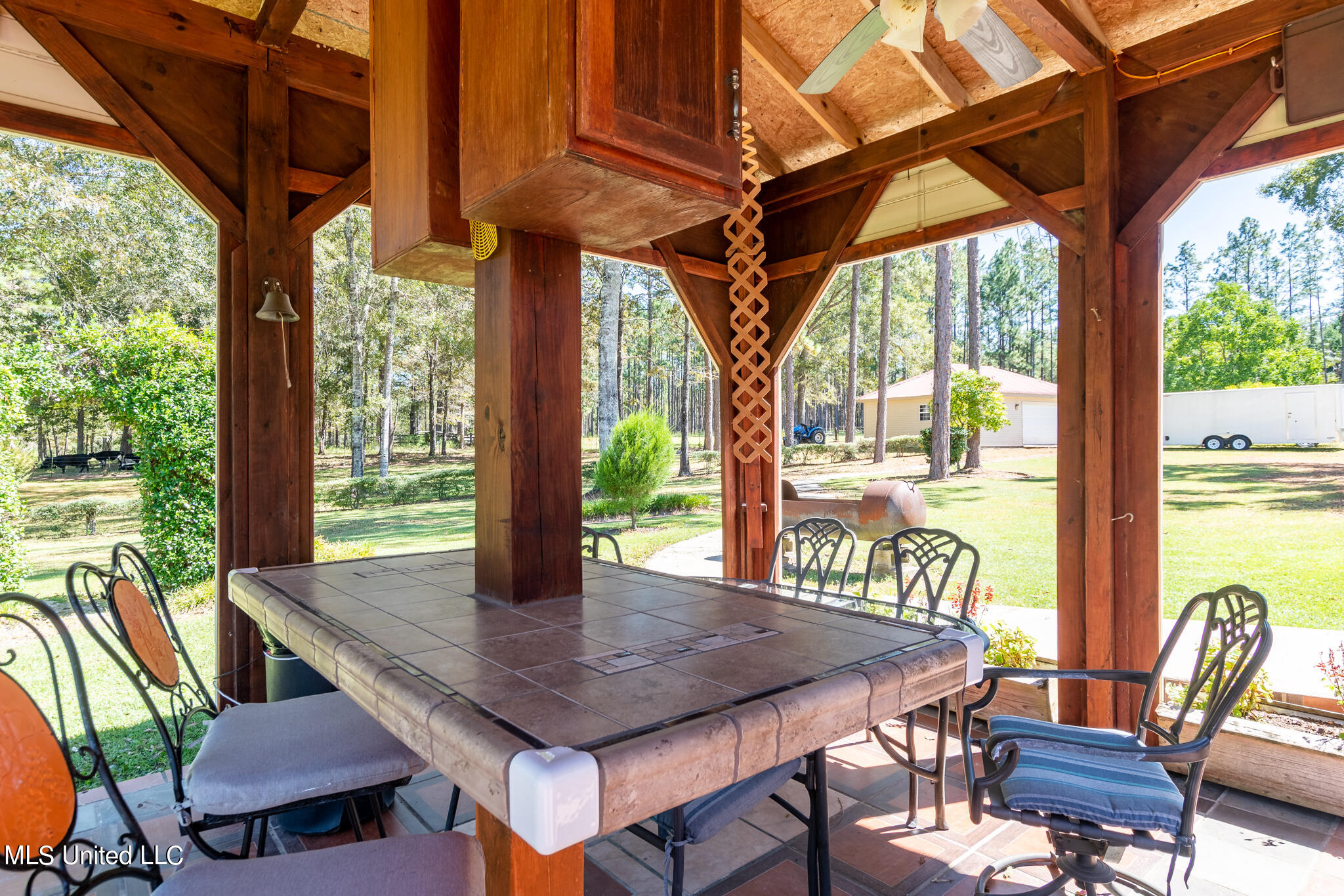 114 East T Poole Road Poplarville, MS 39470 - Photo 9 of 45 Covered patio