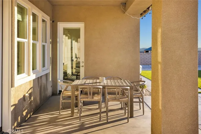 a bathroom with a sink a vanity and a mirror