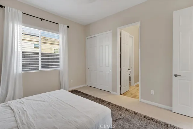 a view of an entryway with wooden floor and door