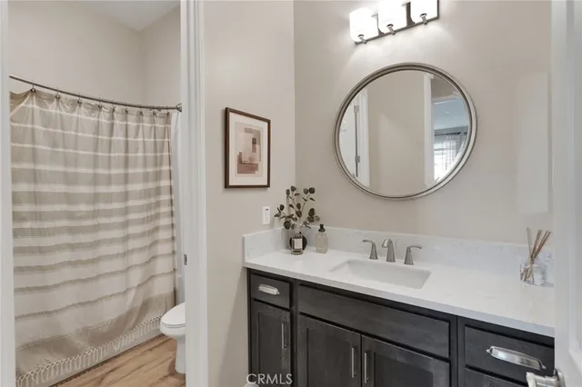 a kitchen with stainless steel appliances granite countertop a stove and a refrigerator