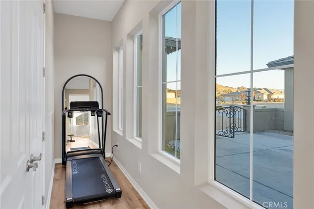 a en suite bathroom with a double vanity sink and a mirror