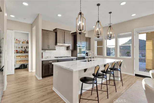 a bedroom with a large bed and a large window