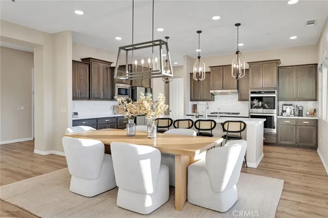 a living room with furniture fireplace and a flat screen tv
