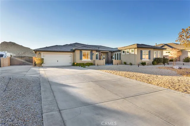 a view of large house with a yard