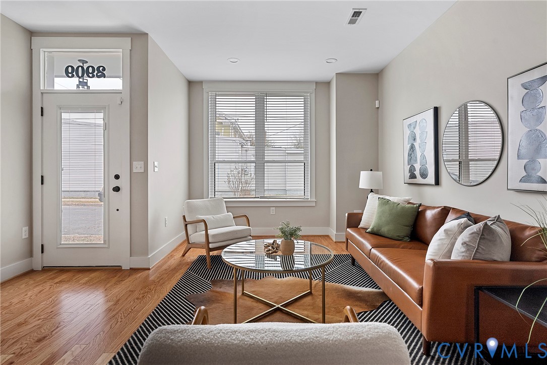 2909 R Street Richmond, VA 23223 - Photo 2 of 50 a living room with furniture and a window