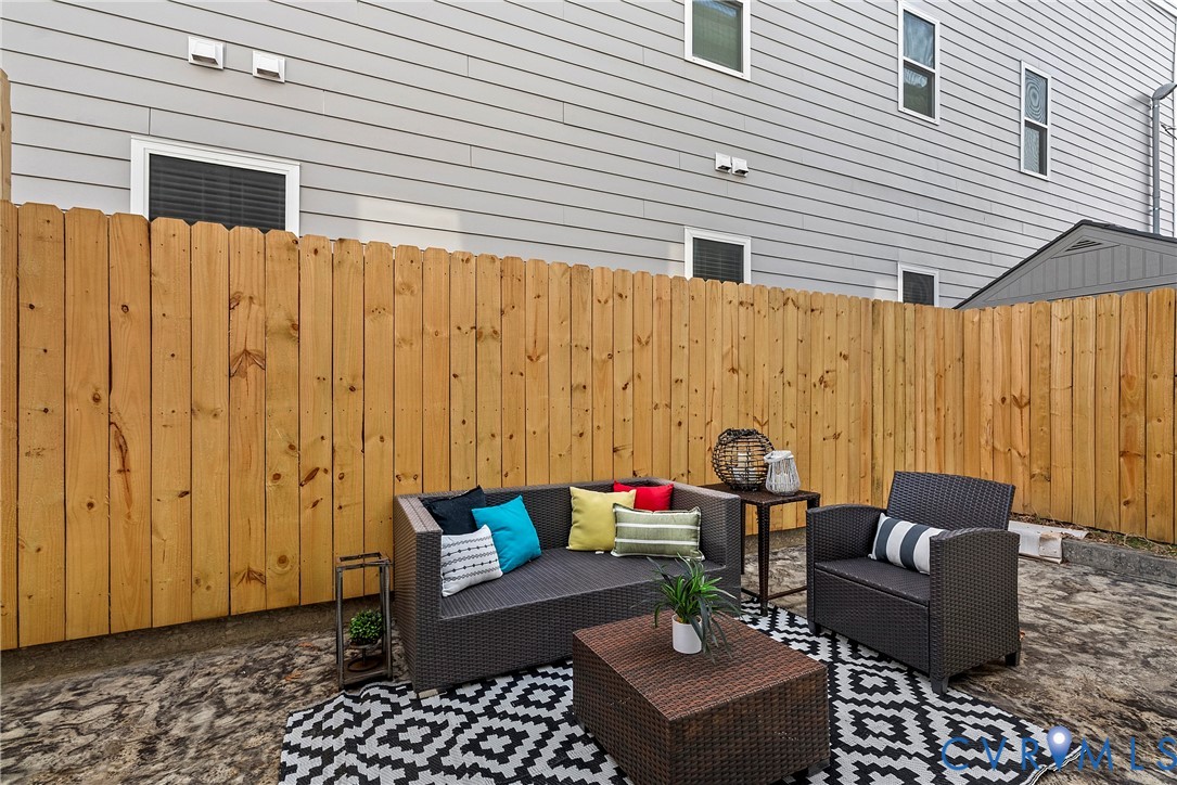 2909 R Street Richmond, VA 23223 - Photo 23 of 50 a outdoor space with patio furniture and a potted plant