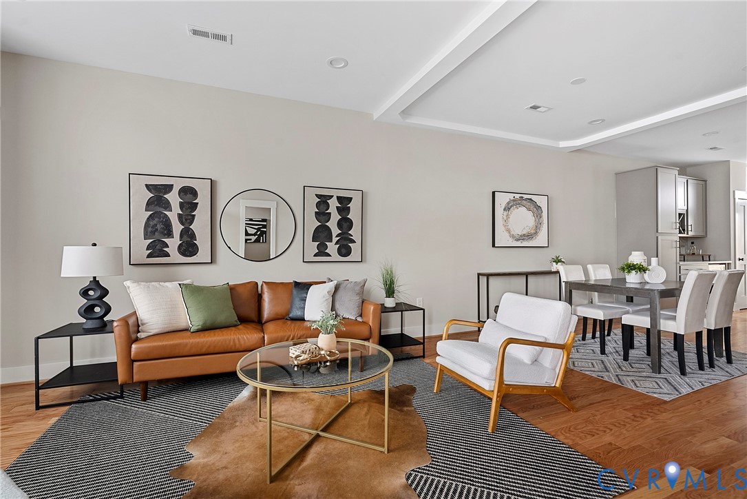 2909 R Street Richmond, VA 23223 - Photo 3 of 50 a living room with furniture a rug and a table