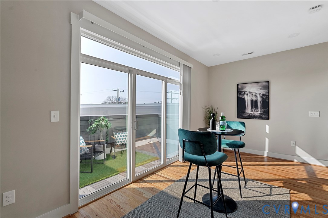 2909 R Street Richmond, VA 23223 - Photo 33 of 50 a workspace room with furniture and wooden floor