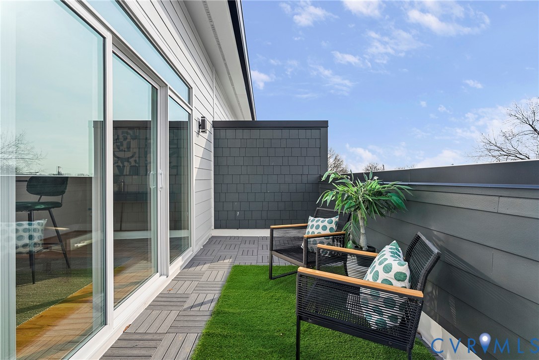 2909 R Street Richmond, VA 23223 - Photo 34 of 50 a backyard of a house with seating space