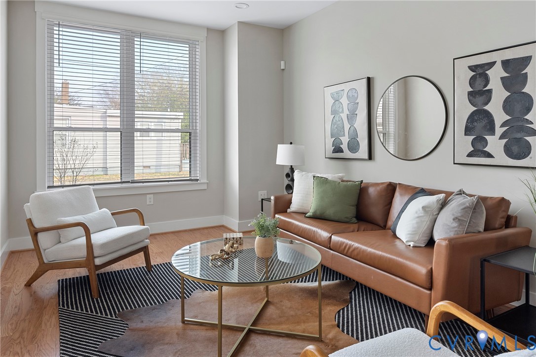 2909 R Street Richmond, VA 23223 - Photo 4 of 50 a living room with furniture and a large window