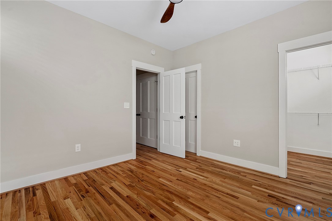 2909 R Street Richmond, VA 23223 - Photo 43 of 50 an empty room with wooden floor and windows