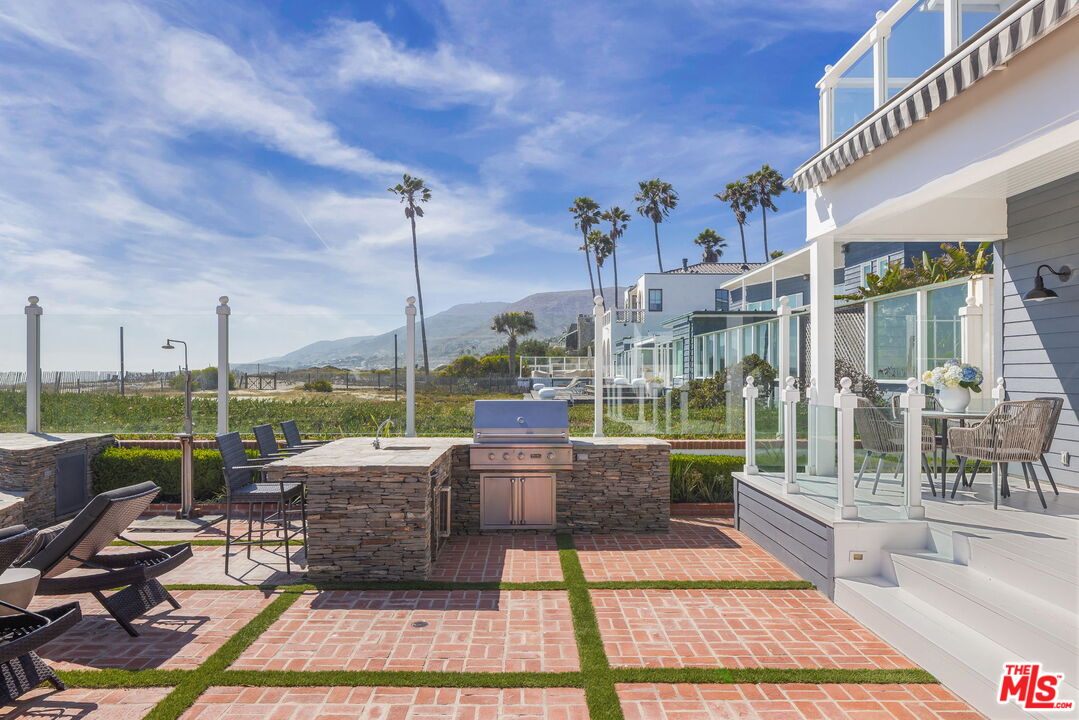 30810 Broad Beach Road Malibu, CA 90265 - Photo 11 of 43 a building outdoor space with patio furniture and garden