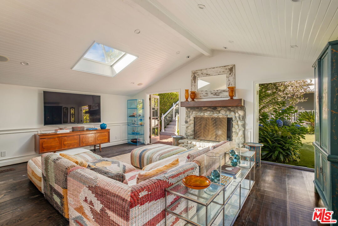 30810 Broad Beach Road Malibu, CA 90265 - Photo 16 of 43 a living room with furniture and a fireplace