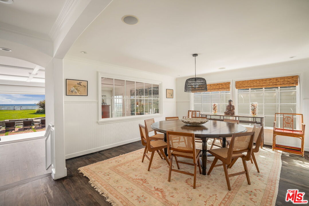 30810 Broad Beach Road Malibu, CA 90265 - Photo 21 of 43 a view of a dining room with furniture window and wooden floor