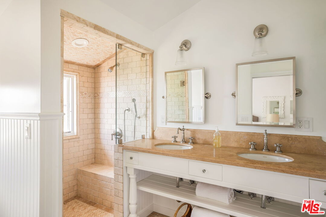 30810 Broad Beach Road Malibu, CA 90265 - Photo 30 of 43 a bathroom with a sink double vanity and a mirror