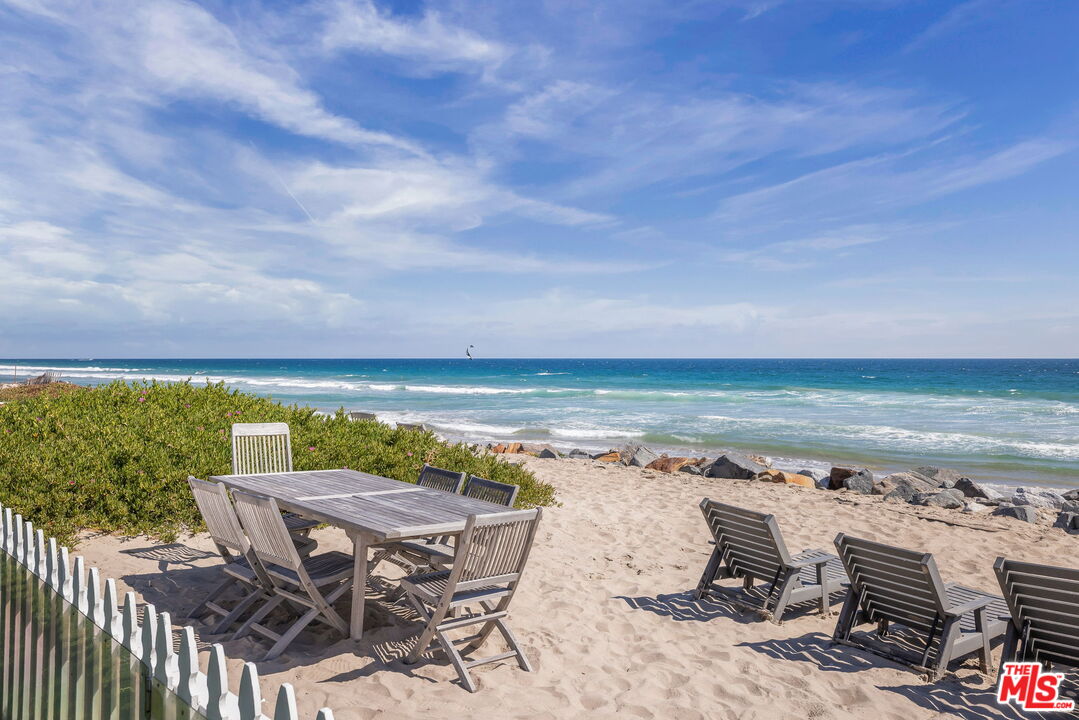 30810 Broad Beach Road Malibu, CA 90265 - Photo 3 of 43 a view of a terrace with chair and table