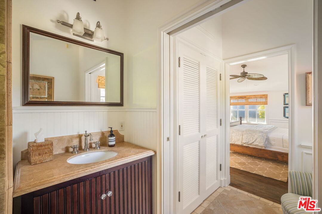 30810 Broad Beach Road Malibu, CA 90265 - Photo 32 of 43 a bathroom with a sink and a mirror