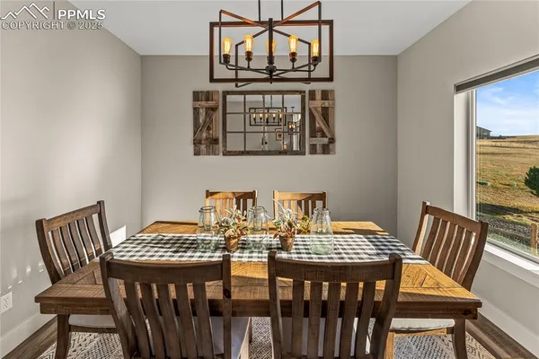 a view of a dining room with furniture
