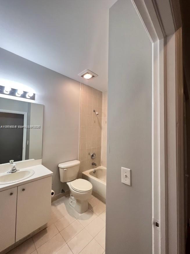 11243 Southwest 230th Terrace Miami, FL 33170 - Photo 16 of 22 a bathroom with a toilet a sink and mirror