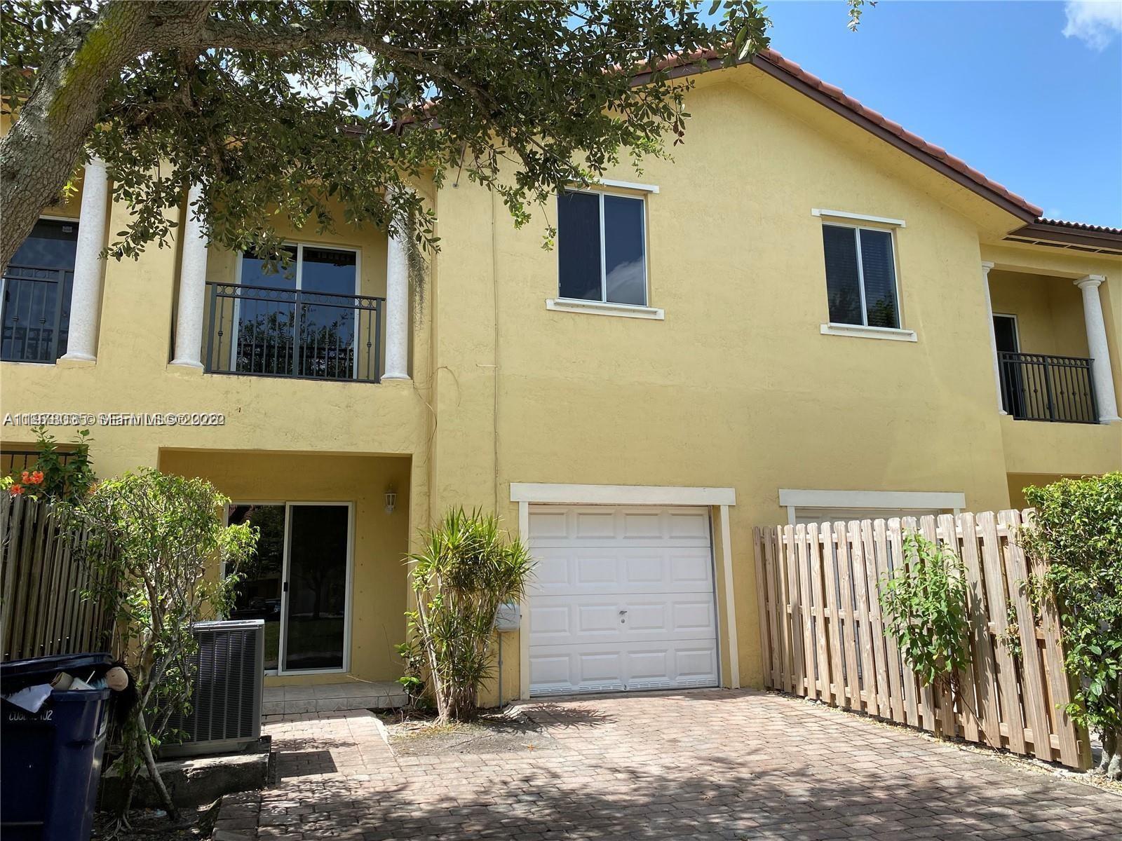 11243 Southwest 230th Terrace Miami, FL 33170 - Photo 21 of 22 a front view of a house with a yard