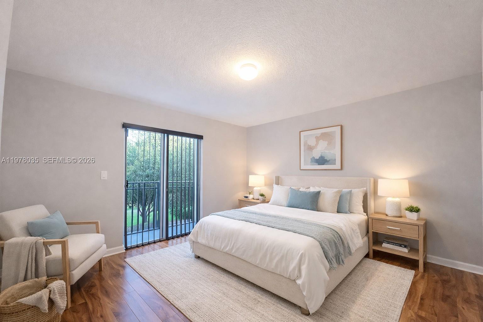 11243 Southwest 230th Terrace Miami, FL 33170 - Photo 8 of 22 a bedroom with a bed and a view of balcony