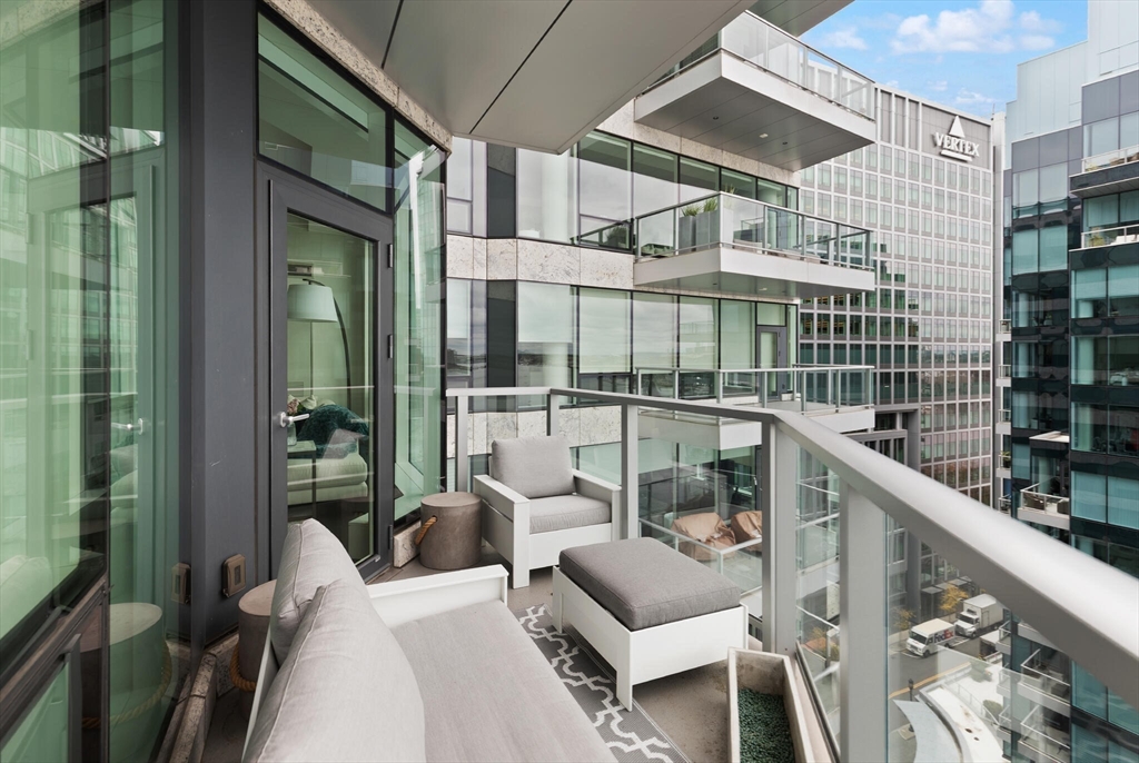 50 Liberty Drive, Unit 11L Boston, MA 02210 - Photo 28 of 40 a balcony with table and chairs