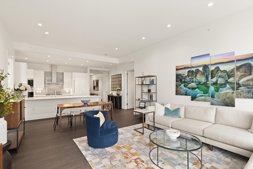 50 Liberty Drive, Unit 11L Boston, MA 02210 - Photo 5 of 40 a living room with furniture and a large window