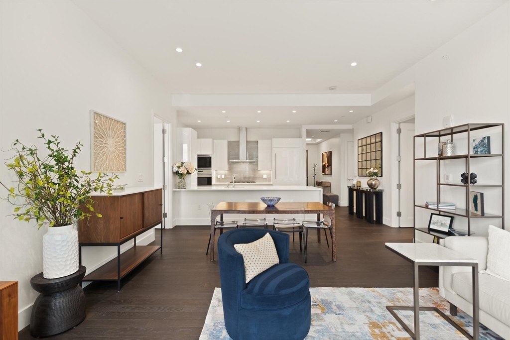 50 Liberty Drive, Unit 11L Boston, MA 02210 - Photo 6 of 40 a living room with furniture and a wooden floor