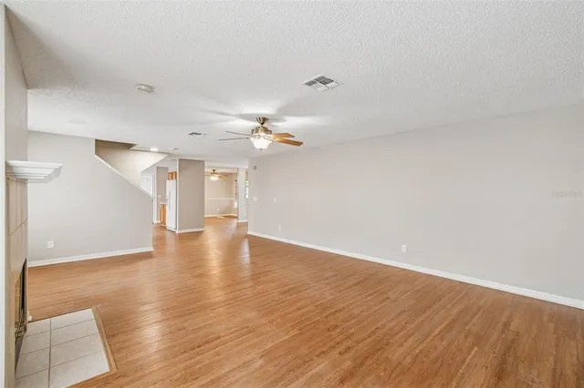 an aerial view of a house with a garden
