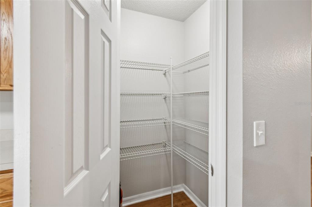 1854 Ridge Valley Street Clermont, FL 34711 - Photo 21 of 73 a view of an empty walk in closet