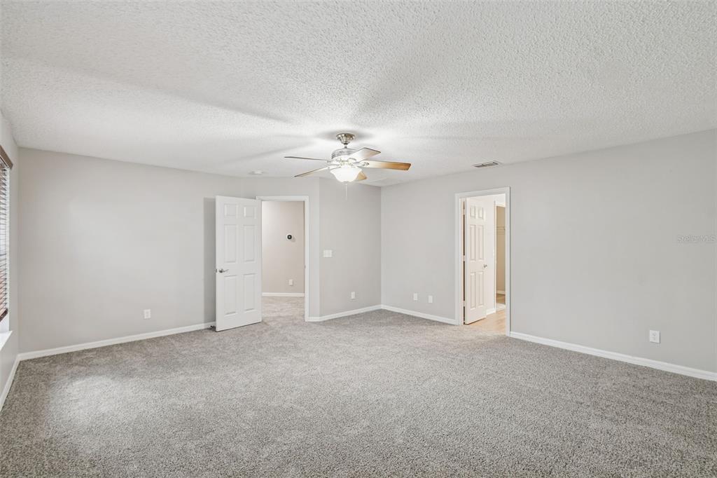 1854 Ridge Valley Street Clermont, FL 34711 - Photo 31 of 73 a view of an empty room with a window
