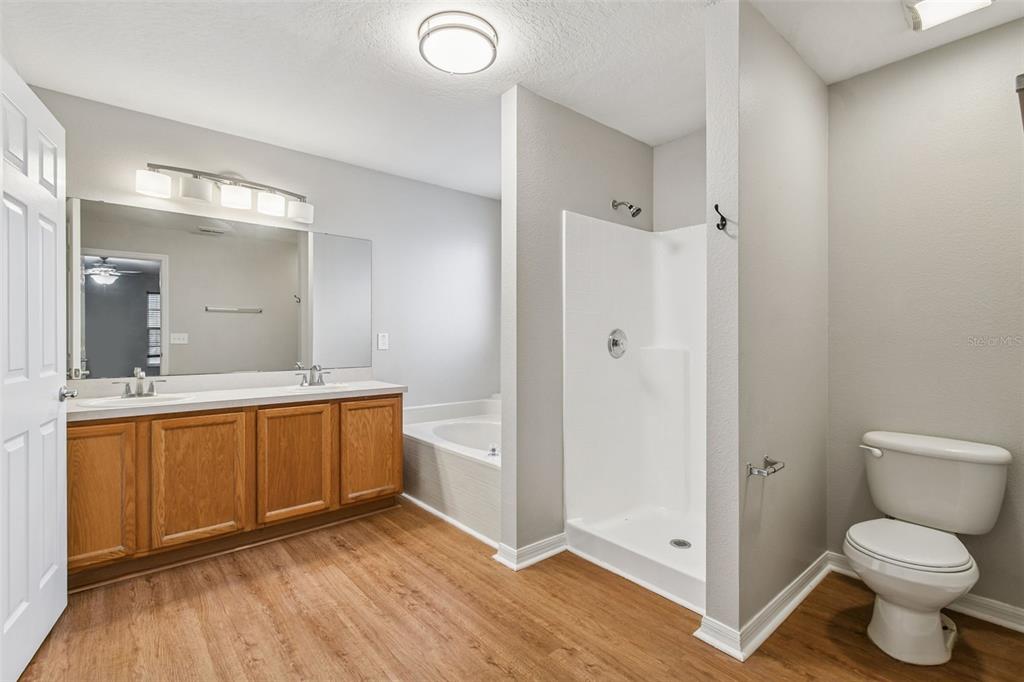 1854 Ridge Valley Street Clermont, FL 34711 - Photo 32 of 73 a bathroom with a sink and a mirror