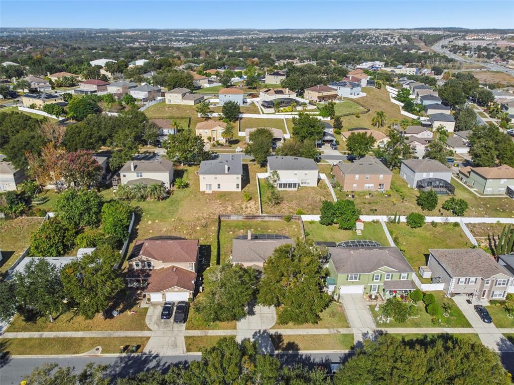 1854 Ridge Valley Street Clermont, FL 34711 - Photo 63 of 73 an aerial view of residential houses with outdoor space