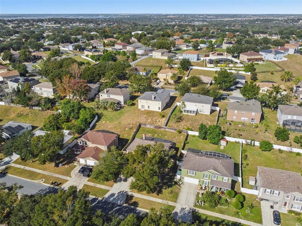 1854 Ridge Valley Street Clermont, FL 34711 - Photo 64 of 73 an aerial view of residential houses with outdoor space