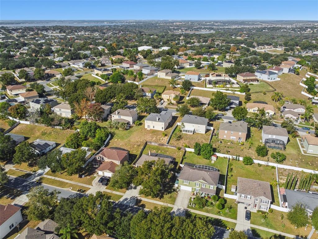 1854 Ridge Valley Street Clermont, FL 34711 - Photo 65 of 73 an aerial view of residential houses with outdoor space